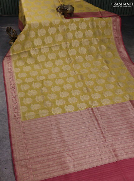 Banarasi silk cotton saree pale yellow and pastel maroon with allover zari woven buttas and zari woven border