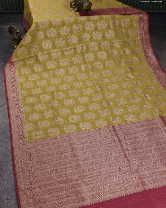 Banarasi silk cotton saree pale yellow and pastel maroon with allover zari woven buttas and zari woven border