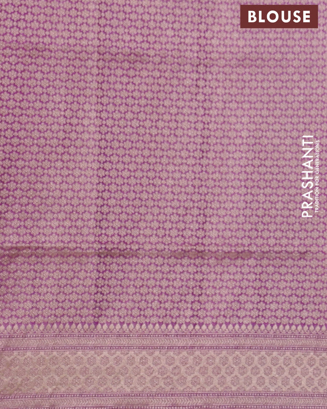 Banarasi uppada tissue silk saree mild purple with allover floral zari weaves and zari woven border