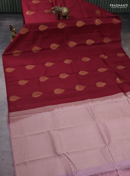 Kanchipuram silk saree maroon and pastel pink with zari woven buttas in borderless style