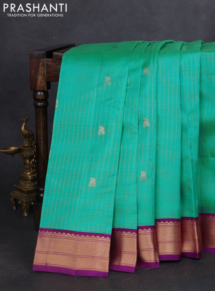 Kanchipuram silk saree teal blue and purple with allover small zari checks & buttas and rich zari woven korvai border