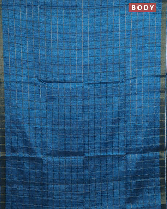 Semi tussar saree cs blue and beige with allover zari checked pattern and kalamkari printed pallu