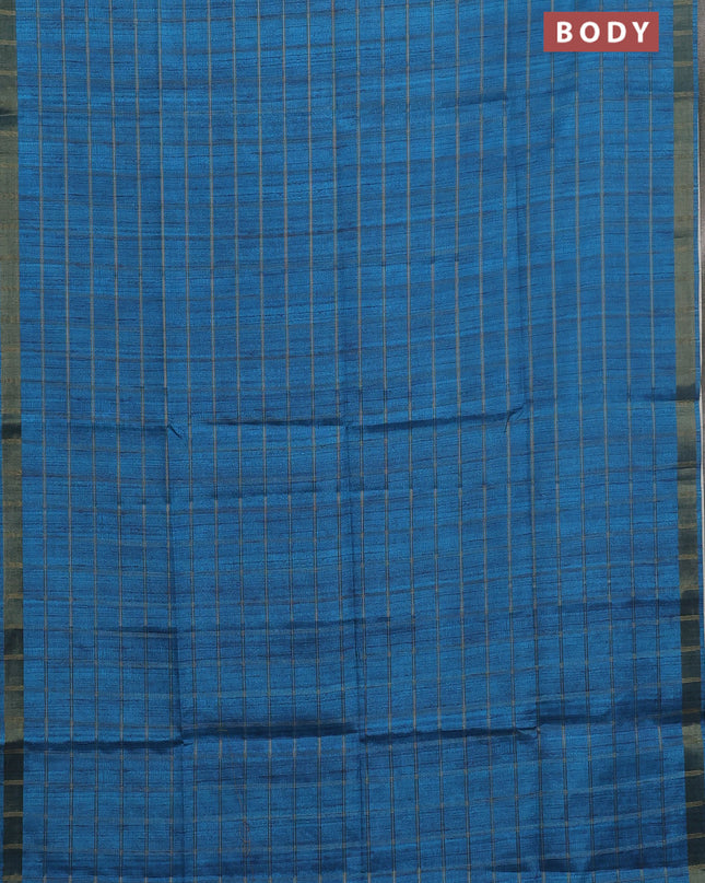 Semi tussar saree cs blue and beige with allover zari checked pattern and kalamkari printed pallu