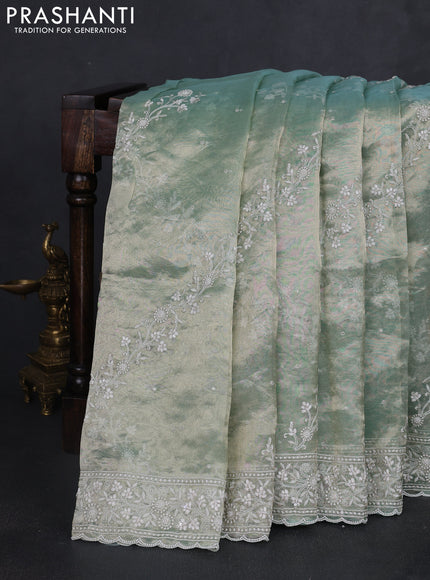Tissue silk saree pastel green with allover embroidery & sequin work