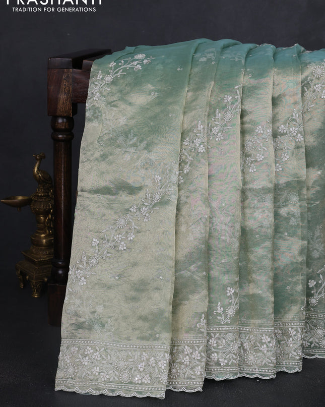 Tissue silk saree pastel green with allover embroidery & sequin work