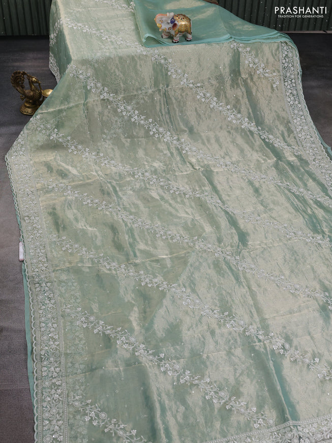 Tissue silk saree pastel green with allover embroidery & sequin work