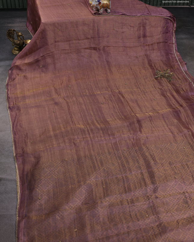 Tissue silk saree dual shade of purple with beaded work and lace work embroidery border