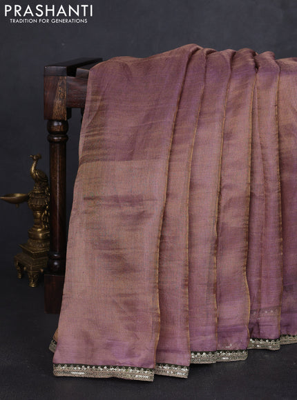 Tissue silk saree dual shade of purple with plain body and lace work embroidery border