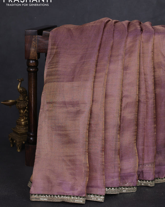 Tissue silk saree dual shade of purple with plain body and lace work embroidery border