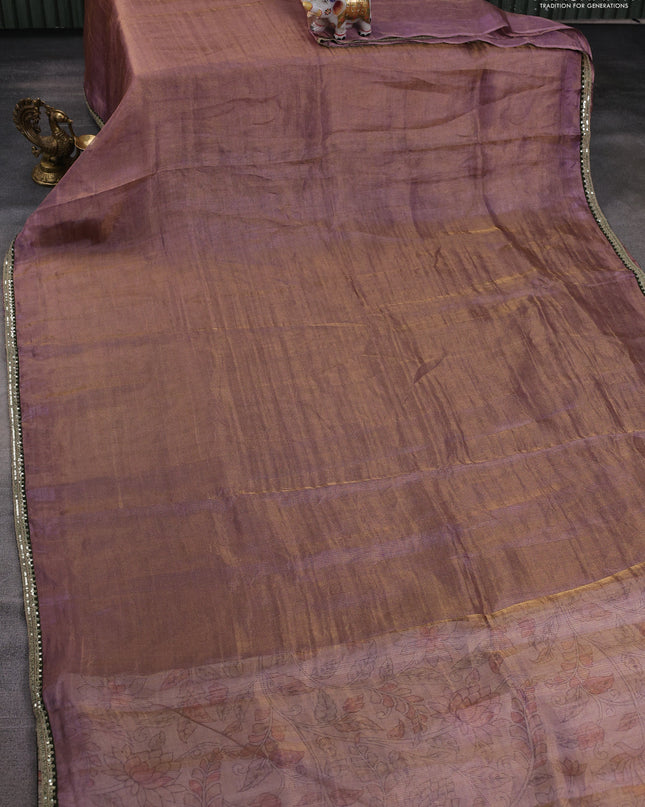 Tissue silk saree dual shade of purple with plain body and lace work embroidery border