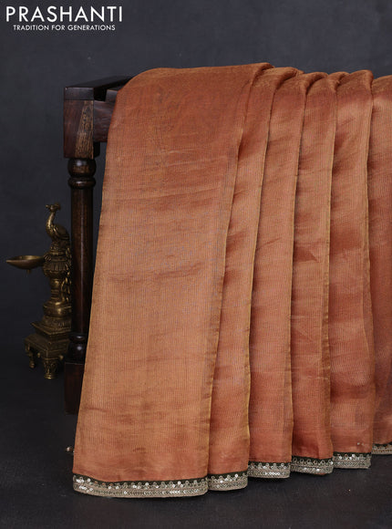 Tissue silk saree sandal with plain body and lace work embroidery border