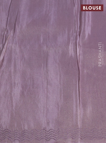 Tissue silk saree mild lavender with allover embroidery work and embroidery border