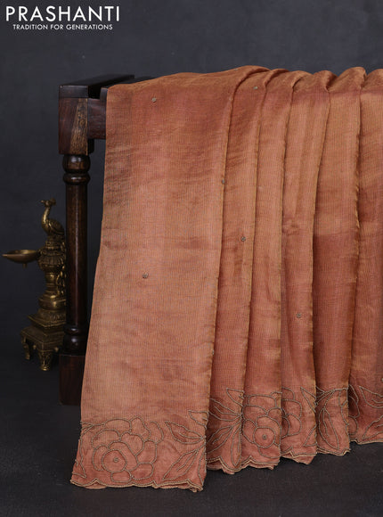 Tissue silk saree rust shade with beaded work and beaded work embroidery border