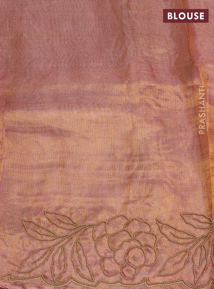 Tissue silk saree brown with beaded work and beaded work embroidery border