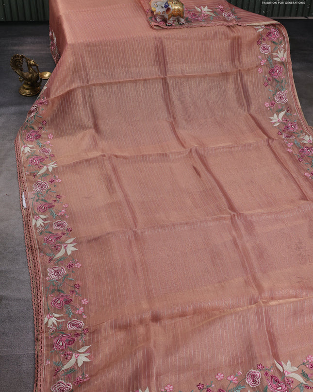 Tissue silk saree peach shade with allover zari weaves and kutch embroidery border