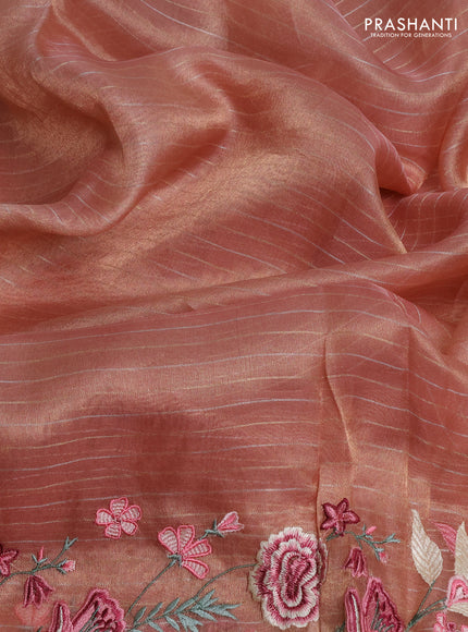 Tissue silk saree peach shade with allover zari weaves and kutch embroidery border