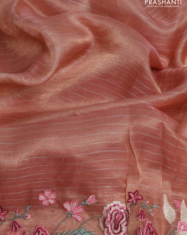 Tissue silk saree peach shade with allover zari weaves and kutch embroidery border