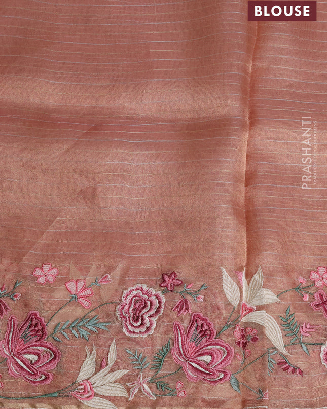 Tissue silk saree peach shade with allover zari weaves and kutch embroidery border