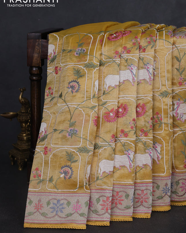 Tissue silk saree yellow with allover pichwai embroidery work and embroidery border