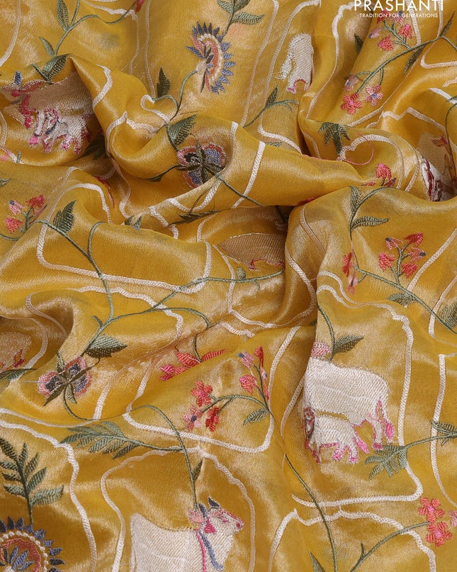 Tissue silk saree yellow with allover pichwai embroidery work and embroidery border
