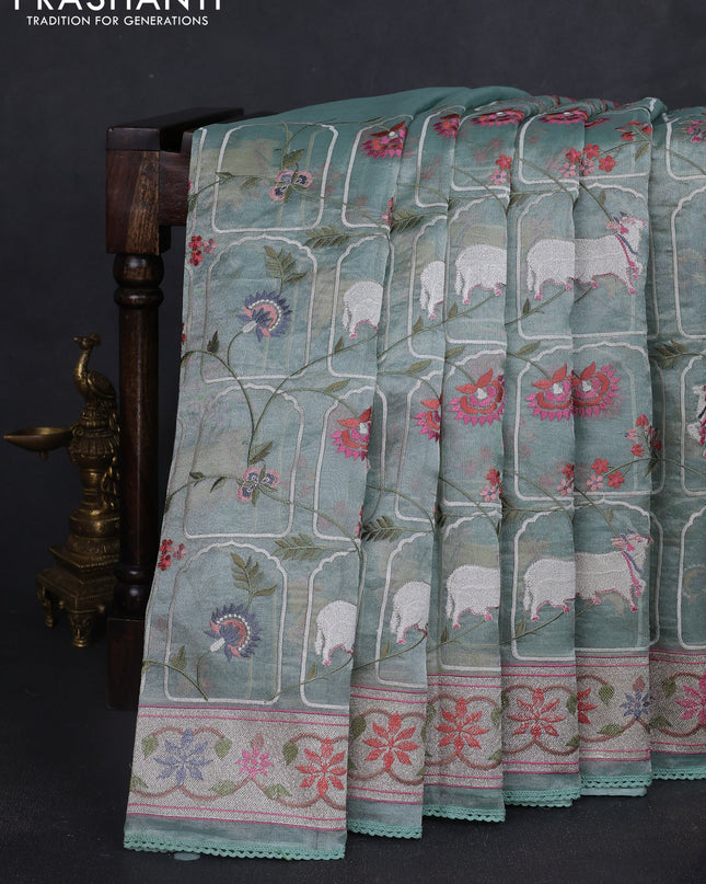 Tissue silk saree pastel green with allover pichwai embroidery work and embroidery border