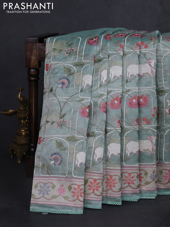 Tissue silk saree pastel green with allover pichwai embroidery work and embroidery border