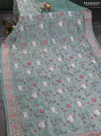 Tissue silk saree pastel green with allover pichwai embroidery work and embroidery border
