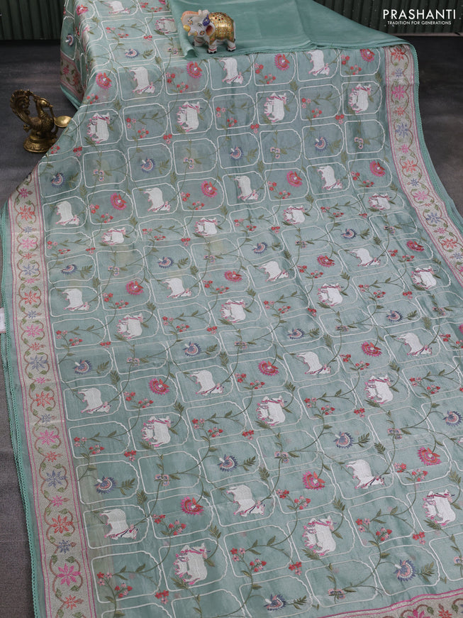 Tissue silk saree pastel green with allover pichwai embroidery work and embroidery border