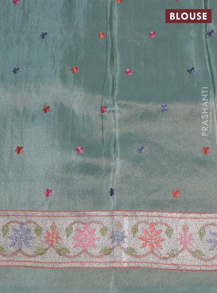 Tissue silk saree pastel green with allover pichwai embroidery work and embroidery border