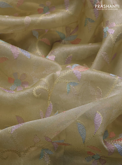 Tissue silk saree mild pista green with allover embroidery work