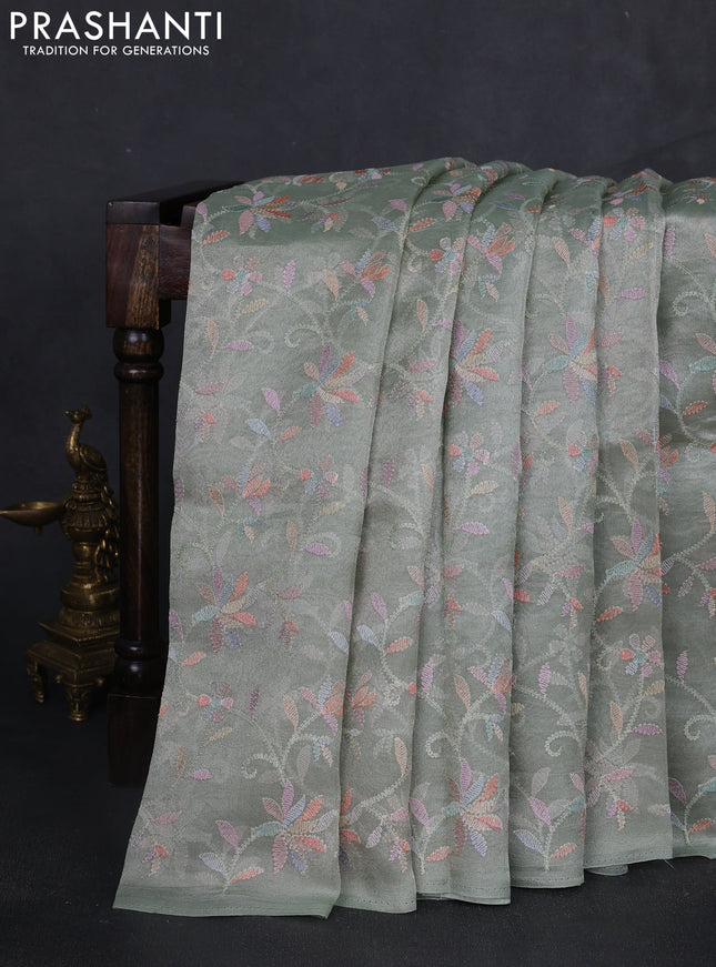 Tissue silk saree pastel green with allover embroidery work