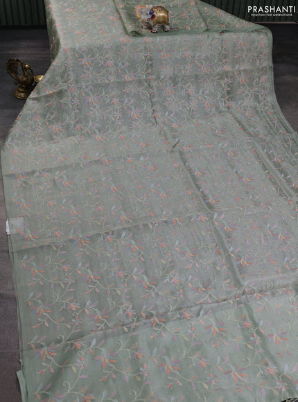 Tissue silk saree pastel green with allover embroidery work