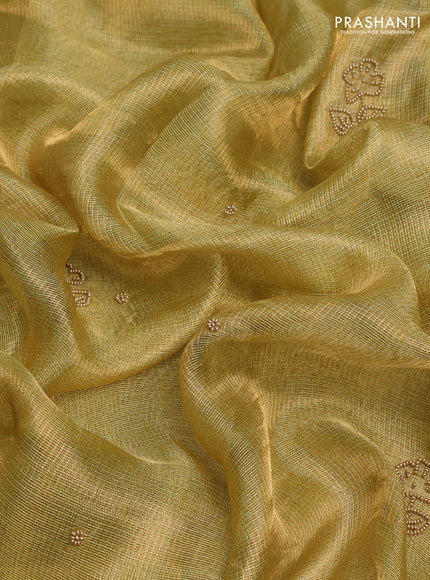 Tissue silk saree dual shade of pista green with beaded work and beaded work embroidery border