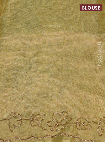 Tissue silk saree dual shade of pista green with beaded work and beaded work embroidery border