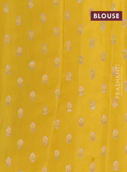 Semi mysore silk saree black and rust shade with plain body and zari woven border