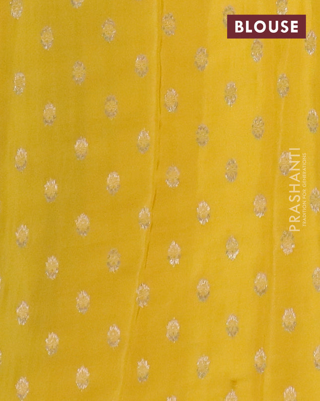Semi mysore silk saree black and rust shade with plain body and zari woven border