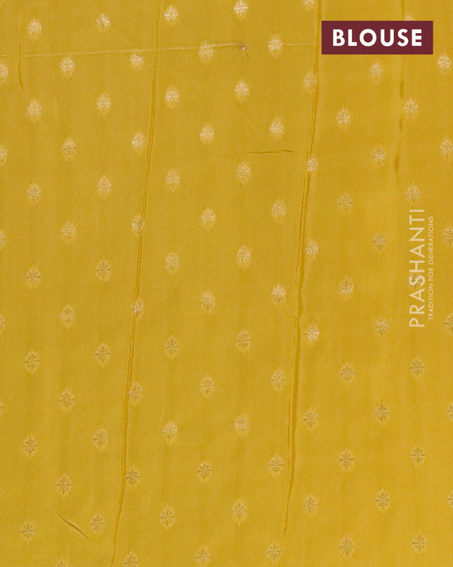 Semi mysore silk saree green and yellow with plain body and zari woven border