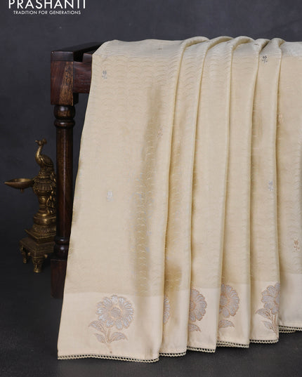 Banarasi silk saree cream with allover zari woven brocade weaves and embroidery pallu & zari woven butta border