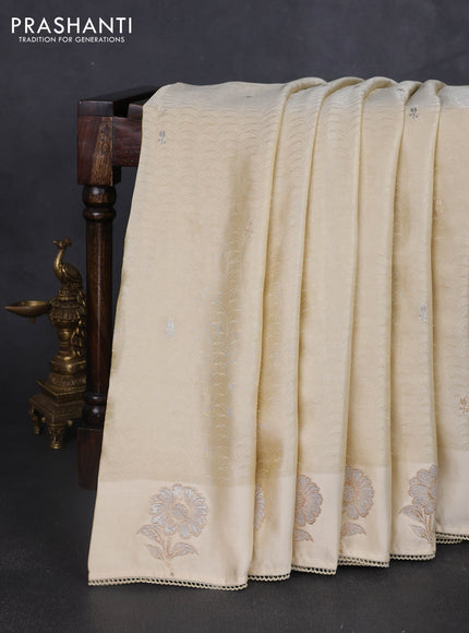 Banarasi silk saree cream with allover zari woven brocade weaves and embroidery pallu & zari woven butta border