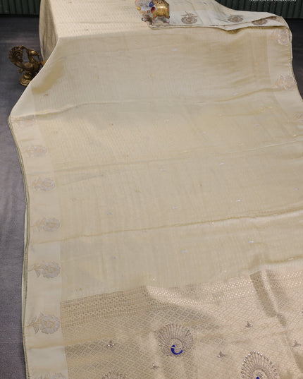 Banarasi silk saree cream with allover zari woven brocade weaves and embroidery pallu & zari woven butta border