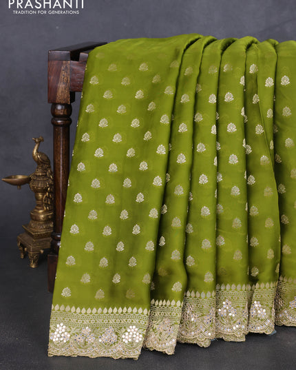 Banarasi silk saree mehendi green with allover zari woven buttas and mirror work embroidery border