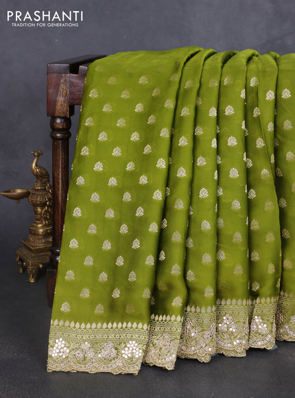 Banarasi silk saree mehendi green with allover zari woven buttas and mirror work embroidery border
