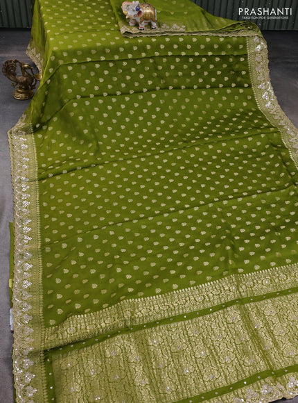 Banarasi silk saree mehendi green with allover zari woven buttas and mirror work embroidery border
