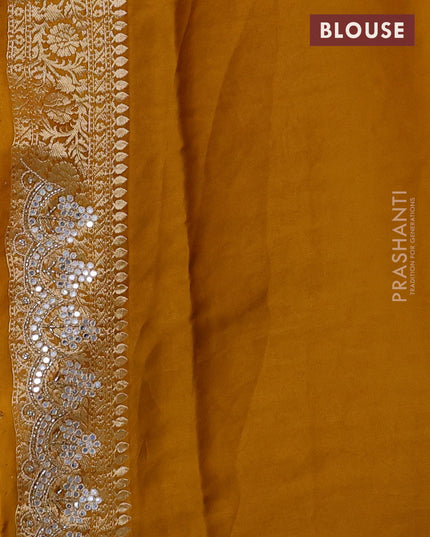 Banarasi silk saree dark mustard with allover zari woven buttas and mirror work embroidery border