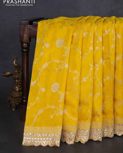 Banarasi silk saree yellow with allover floral zari weaves and mirror gotapatti embroidery border