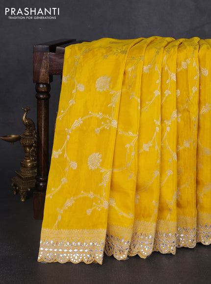 Banarasi silk saree yellow with allover floral zari weaves and mirror gotapatti embroidery border