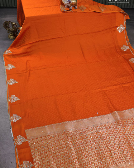 Banarasi silk saree orange with allover self emboss and mirror work embroidery pallu