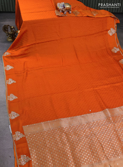 Banarasi silk saree orange with allover self emboss and mirror work embroidery pallu