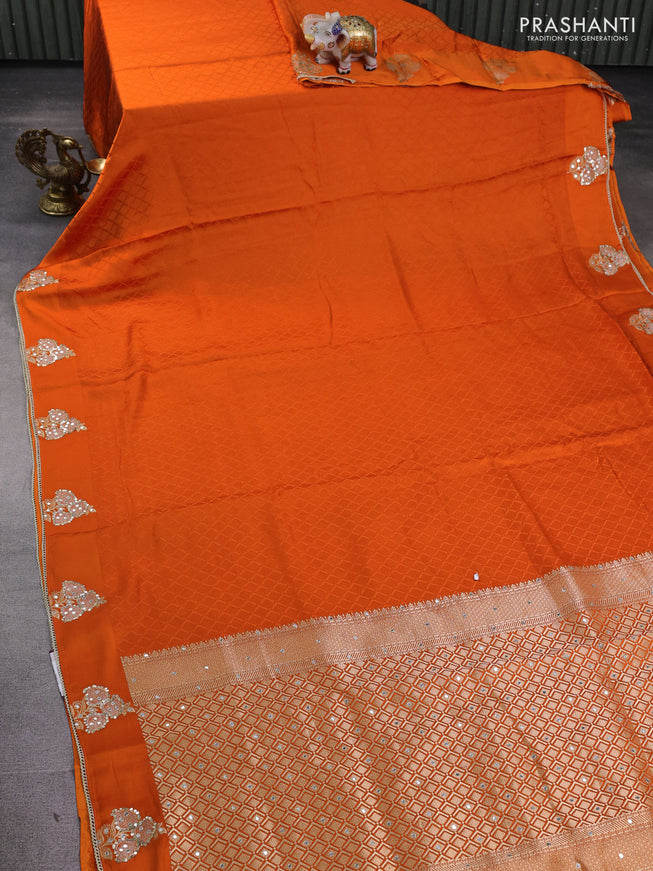 Banarasi silk saree orange with allover self emboss and mirror work embroidery pallu