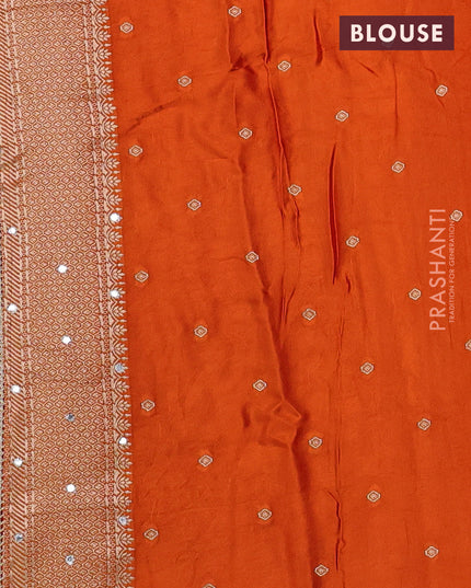 Banarasi silk saree orange with allover self emboss and mirror work embroidery pallu